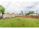 Spacious backyard with a large lawn area, and a garden, great for outdoor activities and gardening at 1913 Pennsylvania St, Columbus, IN 47201