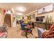 Finished basement featuring a recreation area, and comfortable seating, perfect for entertainment at 1913 Pennsylvania St, Columbus, IN 47201