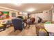 Spacious basement with cozy seating area, recreational equipment, and a comfortable, inviting atmosphere at 1913 Pennsylvania St, Columbus, IN 47201