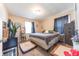 Serene main bedroom with a neutral color scheme, soft carpet, and a cozy ambiance for relaxation at 1913 Pennsylvania St, Columbus, IN 47201
