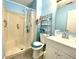 Bathroom featuring shower and vanity with storage at 199 Fountain Lake S Dr, Shelbyville, IN 46176