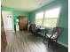Bright office featuring hardwood floors, a desk, and natural light at 199 Fountain Lake S Dr, Shelbyville, IN 46176