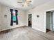 An empty bedroom featuring hardwood floors and natural light at 2006 N Olney St, Indianapolis, IN 46218