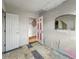 Bedroom featuring light walls, and a large door at 2006 N Olney St, Indianapolis, IN 46218