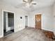 Empty bedroom with hardwood floors and multiple doorways at 2006 N Olney St, Indianapolis, IN 46218