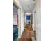 A hallway with multiple rooms leading to various areas of the home at 2006 N Olney St, Indianapolis, IN 46218