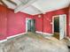 Spacious living room with hardwood floors, good natural light, and freshly painted walls at 2006 N Olney St, Indianapolis, IN 46218