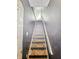 The stairwell leading from one floor to the next at 2006 N Olney St, Indianapolis, IN 46218