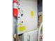 A utility closet containing equipment such as the air handler and a fire extinguisher at 2006 N Olney St, Indianapolis, IN 46218