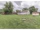 Expansive backyard with ample space, featuring a shed, above-ground pool, and room for outdoor activities at 2010 Alexandria Dr, Greenfield, IN 46140