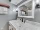 Bathroom featuring a marble vanity with oil rubbed bronze faucet and hardware and a decorative mirror at 2010 Alexandria Dr, Greenfield, IN 46140