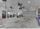 Large garage with high ceilings, multiple ceiling fans, and a large open work area at 2010 Alexandria Dr, Greenfield, IN 46140