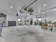 This large garage with fans, tools, and workbenches is the perfect place to work on projects at 2010 Alexandria Dr, Greenfield, IN 46140