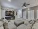 Cozy living room features a large television, comfortable sectional sofa, and neutral decor at 2010 Alexandria Dr, Greenfield, IN 46140