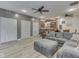 Open living space featuring built-in bar, storage closets, and comfortable seating area at 2010 Alexandria Dr, Greenfield, IN 46140