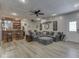 Spacious living room with a fully stocked bar, comfortable seating, and stylish decor at 2010 Alexandria Dr, Greenfield, IN 46140