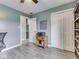 Office featuring neutral paint, hardwood floors, closet, and view into kitchen at 2010 Alexandria Dr, Greenfield, IN 46140