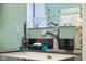 Close-up of a well-appointed bathroom vanity featuring modern fixtures and stylish accessories at 2021 Chestnut St, Columbus, IN 47201