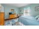 Inviting bedroom featuring a serene color palette, creating a relaxing retreat with comfortable furnishings at 2021 Chestnut St, Columbus, IN 47201