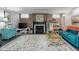 Cozy basement Gathering room with fireplace, TV, and comfortable seating area, perfect for relaxing at 2021 Chestnut St, Columbus, IN 47201