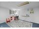 Bright basement office with pink desk, ample lighting, and cozy decor at 2021 Chestnut St, Columbus, IN 47201