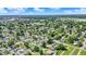 Quaint neighborhood surrounded by lush greenery featuring well-maintained homes with bright, sunny skies at 2110 Fisher Ave, Speedway, IN 46224