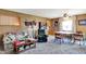 Inviting living area with comfortable seating and a cozy atmosphere, adjacent to the dining area at 2110 Fisher Ave, Speedway, IN 46224
