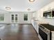 Modern kitchen featuring white cabinets, stainless steel appliances, and an open layout perfect for entertaining at 2116 Orchid Bloom Dr, Indianapolis, IN 46231