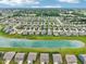 Panoramic aerial showcasing neighborhood layout, streetscape, and proximity to the lake at 220 Sawdust Trl, Greenfield, IN 46140