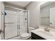 Bathroom featuring a shower with sliding glass doors, neutral paint and a white sink vanity at 220 Sawdust Trl, Greenfield, IN 46140