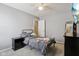 Bright bedroom featuring grey linens, carpeted floors and neutral paint at 220 Sawdust Trl, Greenfield, IN 46140