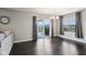 Bright dining area with sliding doors to patio and views of the backyard at 220 Sawdust Trl, Greenfield, IN 46140