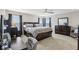 Main bedroom with dark wood furniture, and plenty of natural light at 220 Sawdust Trl, Greenfield, IN 46140