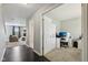 Spacious home office featuring hardwood floors, neutral paint, and a functional workspace at 220 Sawdust Trl, Greenfield, IN 46140