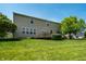 Spacious backyard with a well-maintained lawn and a deck offering outdoor enjoyment at 2209 S Logan Dr, New Palestine, IN 46163
