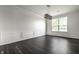 Dining room with decorative trim, hardwood floors, and modern lighting at 2209 S Logan Dr, New Palestine, IN 46163