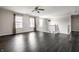 Upstairs loft area featuring hard wood floors and a ceiling fan at 2209 S Logan Dr, New Palestine, IN 46163