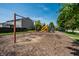 Community playground with swings, slides, and climbing structures for Gathering fun at 2209 S Logan Dr, New Palestine, IN 46163