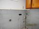 Unfinished basement with block wall, water stains and utility access at 2414 Constellation Dr, Indianapolis, IN 46229