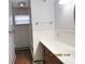 Bathroom features a white tiled backsplash, matching countertop, and neutral wall color at 2414 Constellation Dr, Indianapolis, IN 46229
