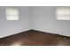 This room features a pair of windows and wood-look flooring at 2414 Constellation Dr, Indianapolis, IN 46229