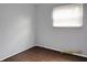Neutral paint and wood-look flooring create a relaxing space in this bedroom at 2414 Constellation Dr, Indianapolis, IN 46229