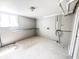Utility basement with concrete block walls and a storage area at 2419 Tamarack Pl, Anderson, IN 46011