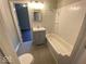 Updated bathroom with a new vanity, subway tile, and tub-shower combo at 2624 E 17Th St, Indianapolis, IN 46218
