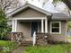 Charming single-story home with stone accents and a welcoming front porch at 2624 E 17Th St, Indianapolis, IN 46218
