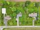 Bird's eye view of a property with a big backyard lawn, mature trees and adjacent neighboring homes at 3020 E 400 S, Lebanon, IN 46052