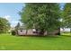 Inviting backyard showcasing a spacious deck, ideal for outdoor entertaining and enjoyment at 3020 E 400 S, Lebanon, IN 46052
