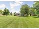 A well-maintained backyard and inviting wooden deck complete with outdoor seating at 3020 E 400 S, Lebanon, IN 46052