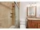 Neutral-toned bathroom featuring a glass shower and vanity with a granite countertop at 3020 E 400 S, Lebanon, IN 46052
