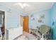 Cozy Bedroom featuring a plush rug and a changing station at 3020 E 400 S, Lebanon, IN 46052